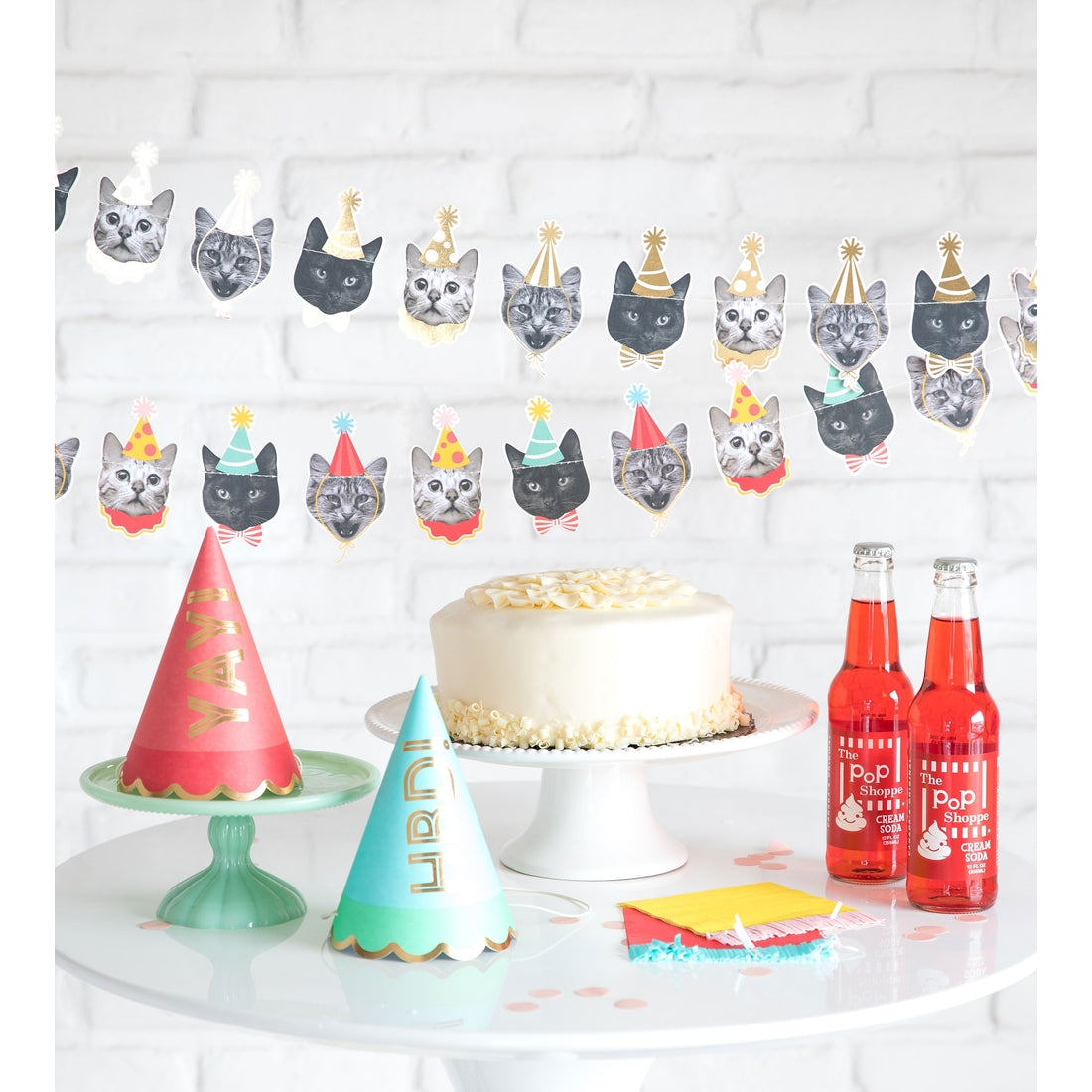 Cat head banner above party table
