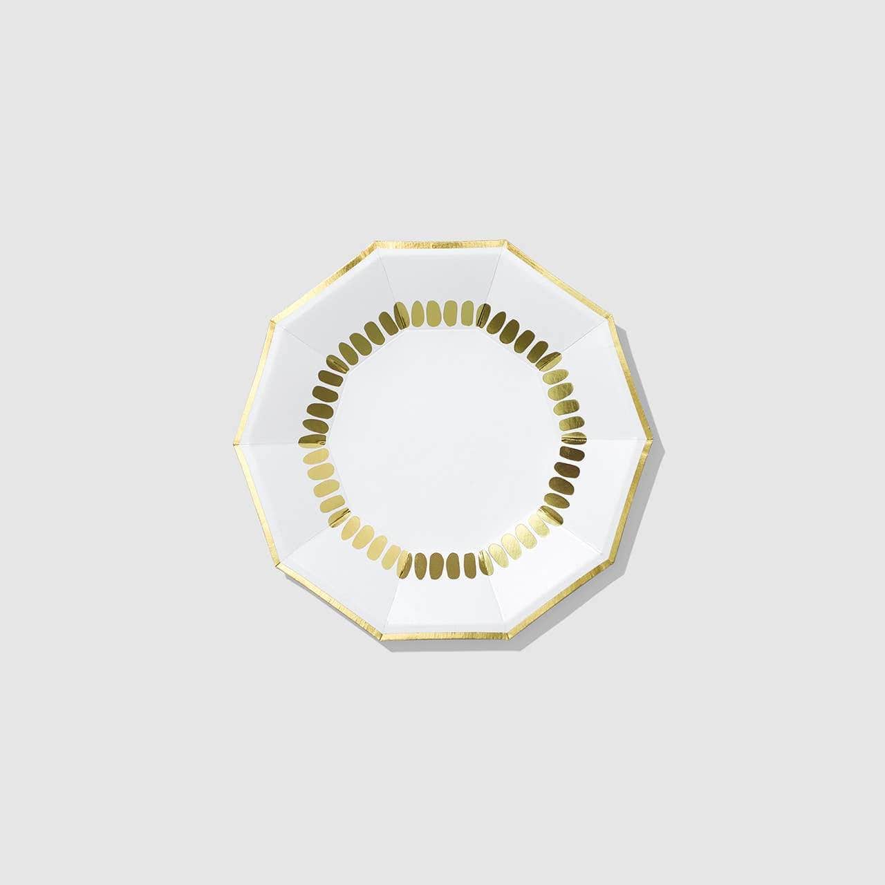 White paper plate with gold trim and brush strokes