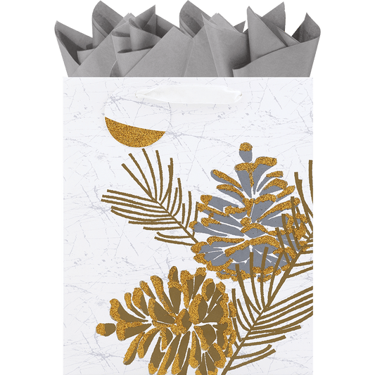 gold glittered pine cones on white gift bag with silver tissue paper